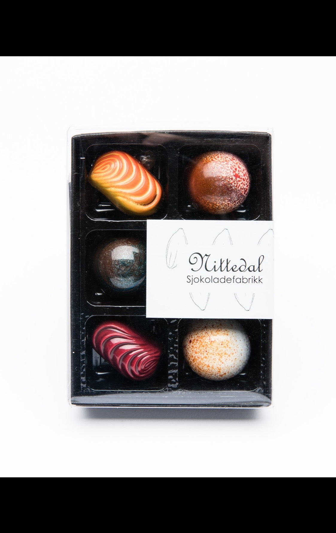 8 konfektbiter i en kjempestor «fyrstikkeske» -Nittedal sjokoladefabrikk